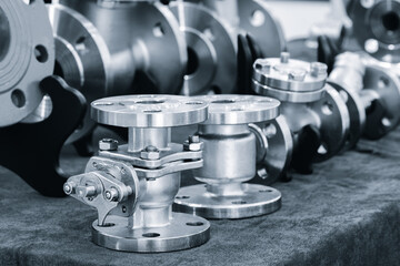 Steel water pipe with a plate on top for bolting. The plate is made of metal and has a hole in the middle. Engineering fittings Industrial concept