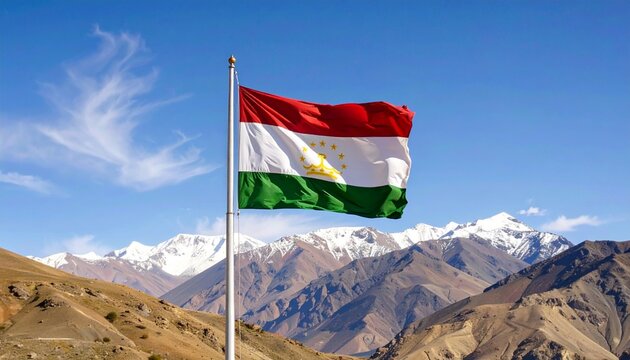 Tajikistan flag waving proudly against a backdrop of scenic mountains and blue sky