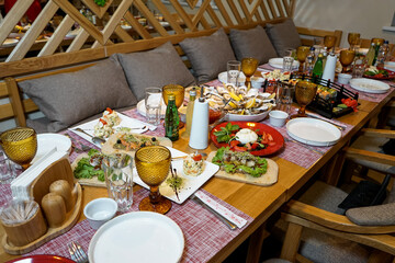 a large table served with other dishes