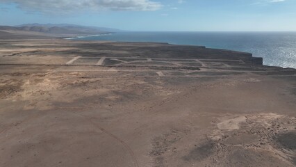 the ocean waves giving wonderful shapes to the cliffs