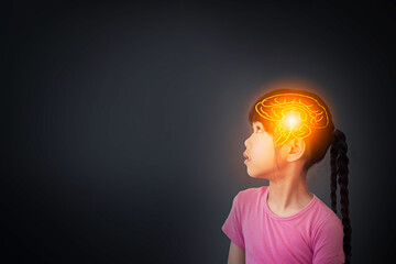 Concept of brain nervous system. Children study and learn , thought process and psychology of children. Cute girl looking up and thinking with hologram image of brain on blank background for text.