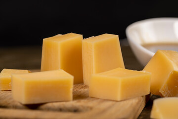 fresh cheese and honey close up, cheese and sweet bee honey