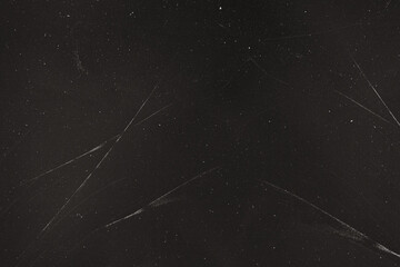 grunge overlay effect with scratch and dust on black background,retro noisy film texture light leak...