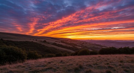Vibrant Sunset Over Rolling Hills