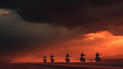 Five motorcyclists navigate a sandy road as the sun sets, casting vibrant colors and shadows.