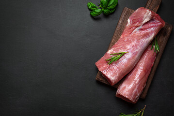 Raw uncooked pork tenderloin meat