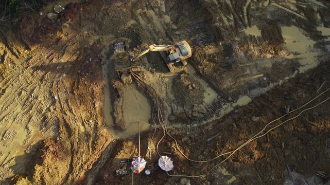Congo &ndash; 4K Drone Aerial of Gold Mining Industry in Rainforest at Sunset