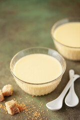 Homemade vanilla custard pudding  in a glass bowl