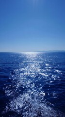 Fototapeta premium Sparkling blue sea under a clear sky on a sunny day in the mediterranean
