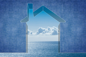 Living near the coast has a positive effect on one’s health - Little house outline against a calm sea with clouds on background - concept image with copy space