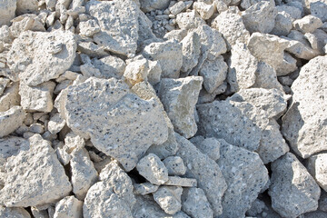 Recovery and recycling of concrete rubble debris on construction site after a demolition of a...