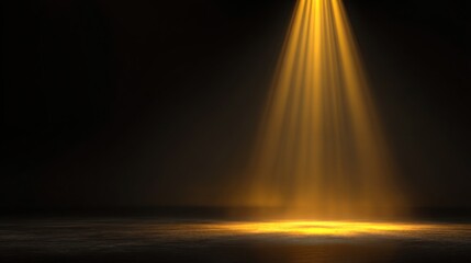 Golden spotlight on a dark stage