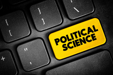 Fototapeta premium Political Science - study of politics and power from domestic, international, and comparative perspectives, text concept button on keyboard