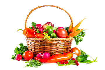 Fresh shiny different vegetables in a wicker basket. Isolated on white background.