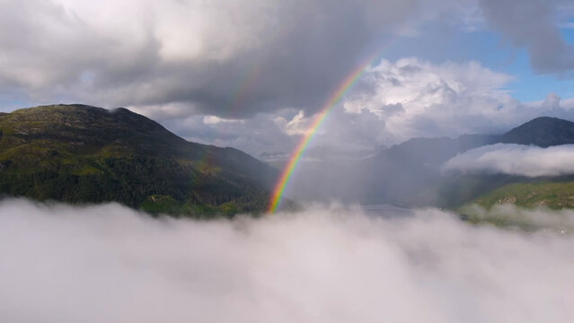 rainbow over the mountains - Powered by Adobe