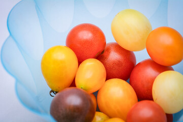 Fresh Cherry Tomatoes on White Studio Background