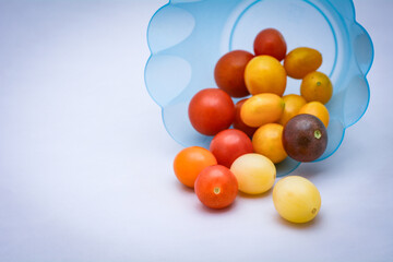 Fresh Cherry Tomatoes on White Studio Background