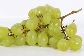 Bunch of green grape on a white background