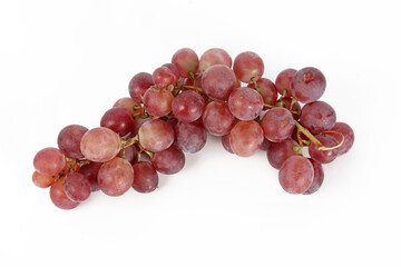 Bunch of red grapes on a white background