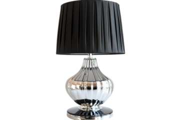 A sleek silver lamp with a textured black shade adds modern elegance to a minimalist interior setting in bright light isolated on transparent background