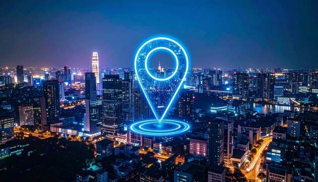 Digital location pin over illuminated cityscape at night.