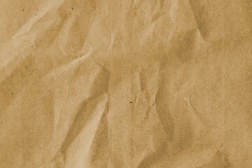 Brown crumpled recycled paper texture background. Kraft Paper