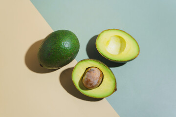 Avocado on a yellow and blue background