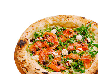 Delicious pizza topped with salmon and arugula in a cozy setting