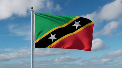 Saint Kitts and Nevis flag waving proudly against a vibrant blue sky with fluffy clouds, national pride