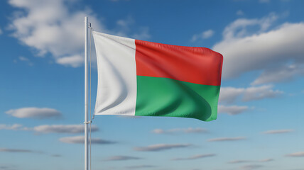 Madagascar flag waving proudly against a vibrant blue sky with fluffy white clouds, representing national pride