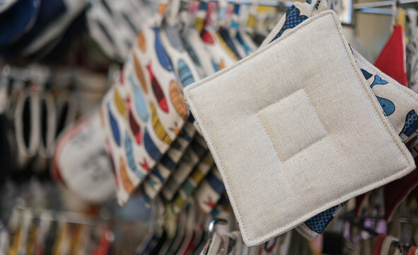 Fototapeta Cotton kitchen potholders at Provence, France street market. Traditional local crafts and sustainable tourism. 