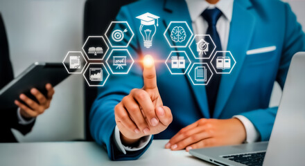 Businessman touching a digital interface with glowing icons representing education, business, and technology, symbolizing innovation and progress in a modern office setting