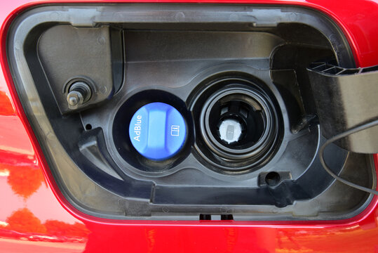 Plastic fuel tank cover on a passenger car