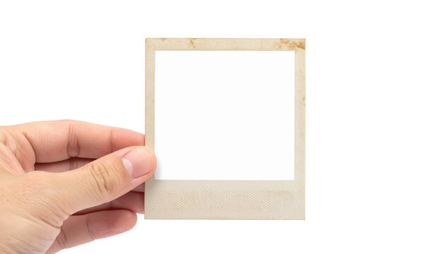 Hand Holding a Blank Instant Photo Frame for a Memory.