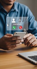 Man holding smartphone with incoming unknown caller alert, deciding whether to answer a suspicious call on his device