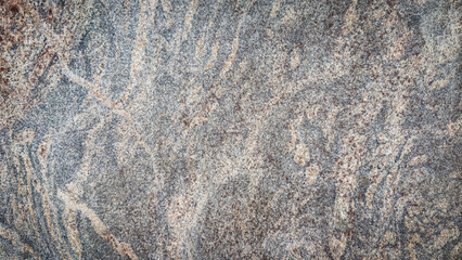 Natural stone texture background with gray, brown, and beige patterns, ideal for abstract design, construction surfaces, interior decor, wallpapers, poster and digital projects.