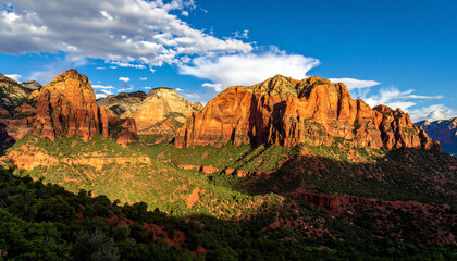 Naklejka premium Zion national park landscape bathed in sunlight with vibrant colors and dramatic sky