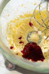 Lemon Spritz Cookie Sandwich with Cranberry Buttercream