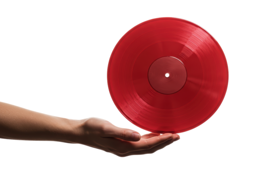 Isolated reddish vinyl record floats gently above a human hand, artful levitation look