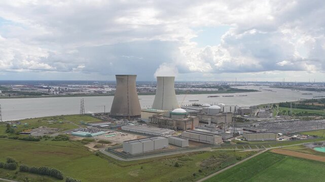 Drone footage over Doel Nuclear Power Plant with air emissions, Belgium