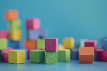 鮮やかな色の積み木を積み上げた遊び心ある子供向け背景