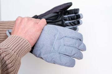 Pair specialized ski gloves for winter sports, insulated, protective, Winter-ready gloves, suitable skiing, snowboarding, cold weather activities, Cold-weather fashion, Practical winter accessory