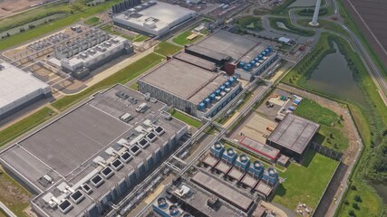 Aerial shot of digital data center facility, cooling towers and IT systems - Powered by Adobe