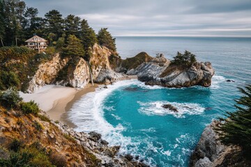 Coastal beach cove with house perched on cliff