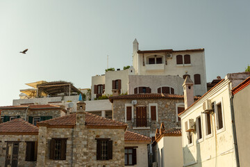 Traditional Mediterranean housing with stone walls, red roofs, Marmaris, Turkey