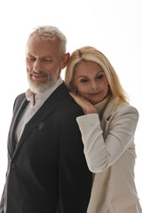 Stylish couple sharing a heartfelt moment showcasing love and elegance in their attire