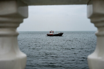 Fishing Boat on Calm Water at Dusk