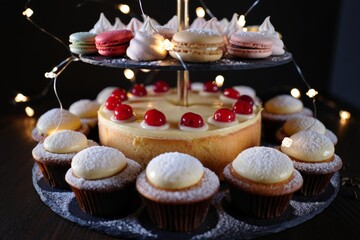 Elegant Dessert Platter Showcasing Sweet Treats and Festive Lights