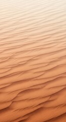 Obraz premium Tranquil Waves of Sand Dunes with Subtle Color Gradation Scenery