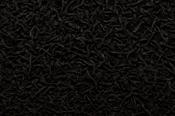 Background of large black tea leaves